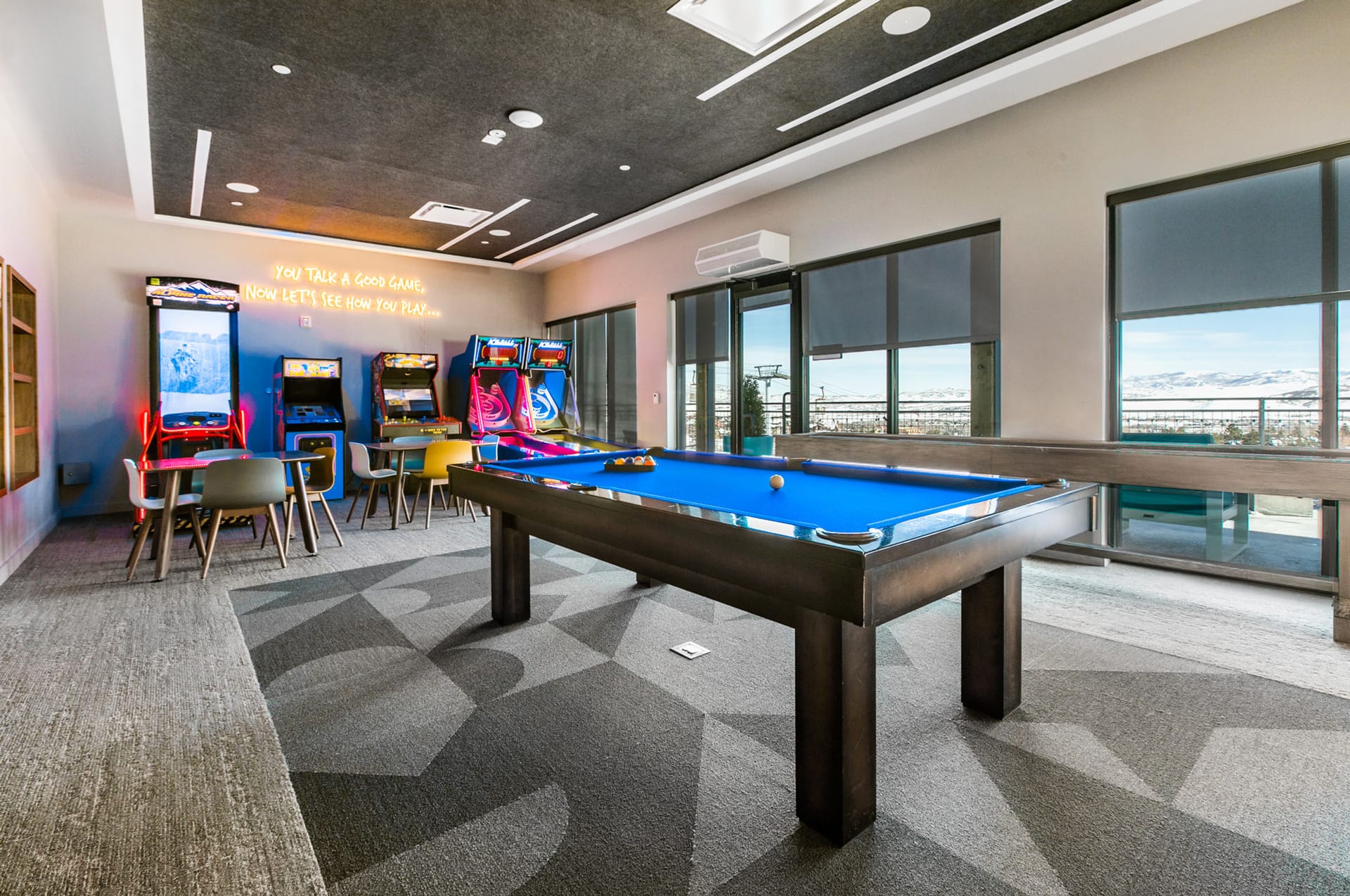 Canyon Haus game room with pool table and arcade