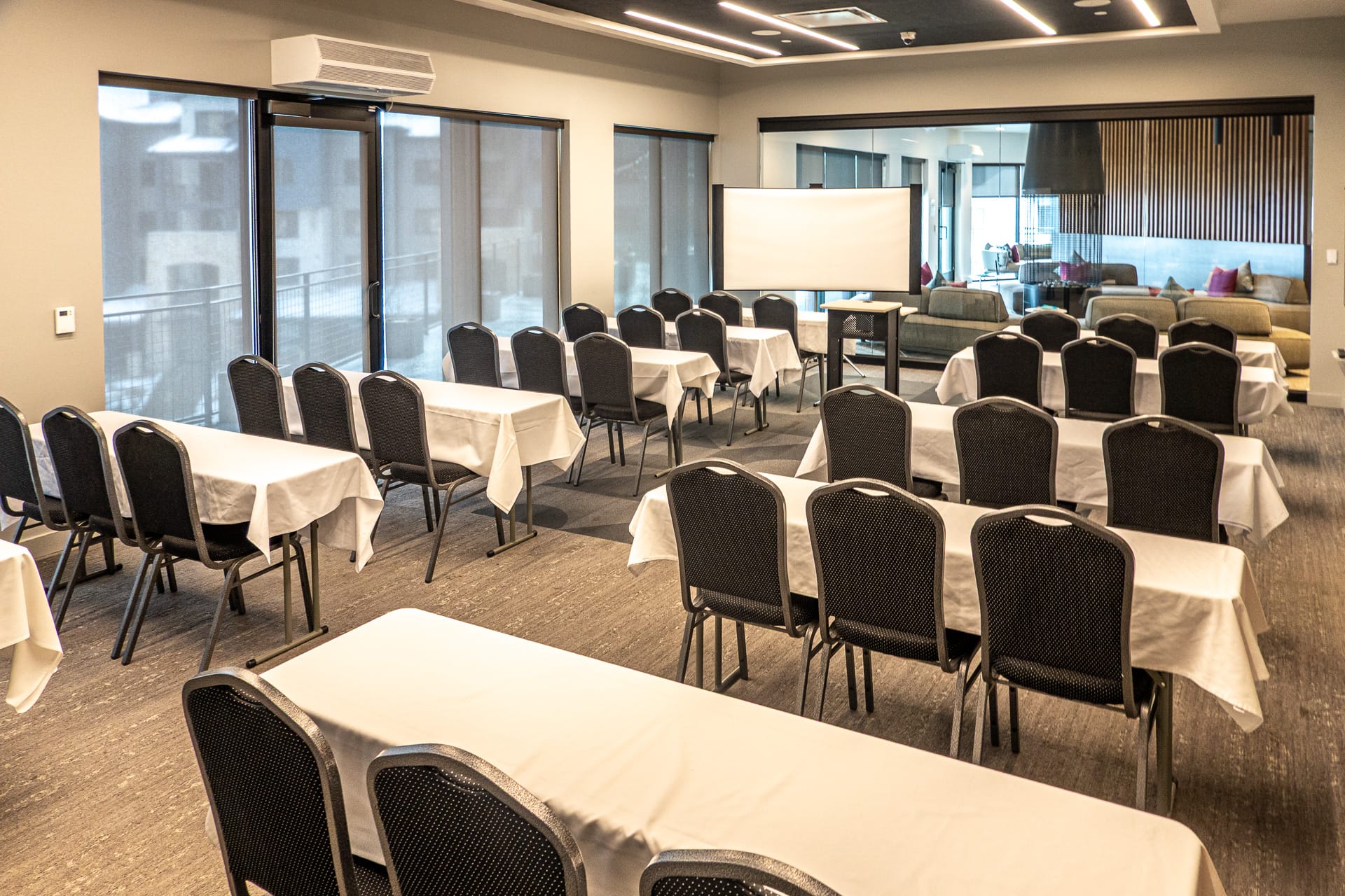 Wasatch Room at Canyon Haus set up classroom-style for a team workshop in Park City